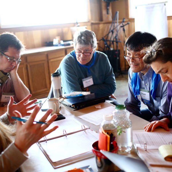 team sitting around table